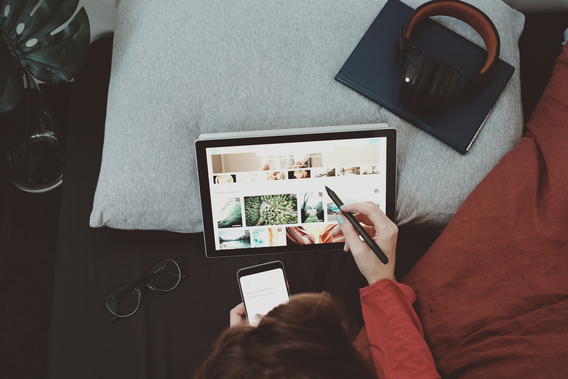 Woman using Canva on tablet